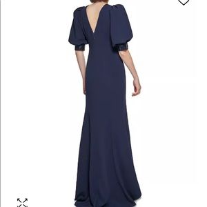 Long, crepe style dress with sequin puff sleeves and v back